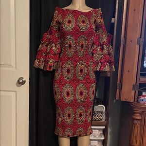 Elegant Red Patterned Cold Shoulder Dress. Comes with head piece.